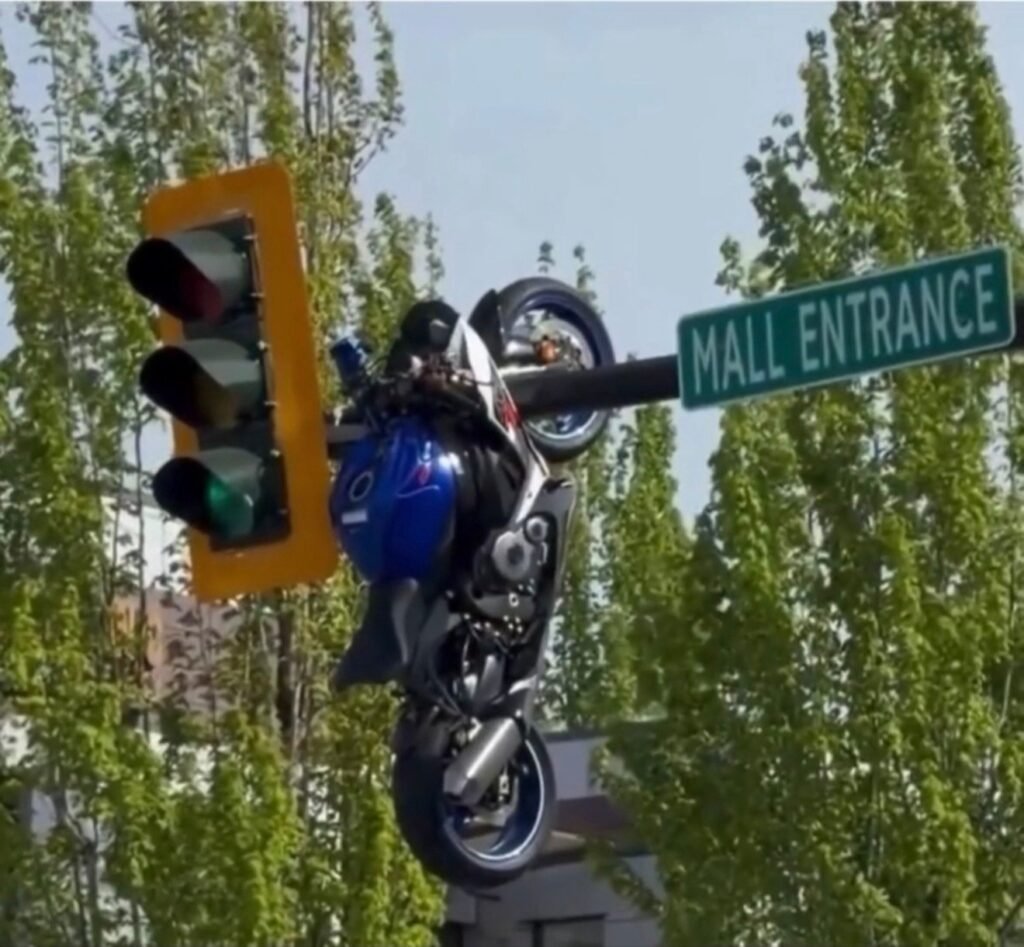 Motorcycle Found Hanging from Street Light After Major Crash at 71 Avenue and Scott Road